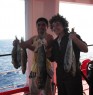 Me and my Philipino friend fishing after duty on the ship. 