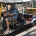 Me pretending to drive the tuk tuk in Bangkok 