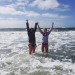 My friend and I freezing our legs off in the East Sea in Ger