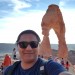 In front of Delicate Arch, Moab, Utah, USA.