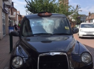 Black cab in Epsom