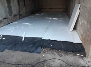 Sheets of insulation laying