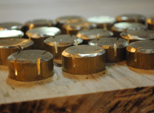 Brass dishes with scratches carved in for better fixation