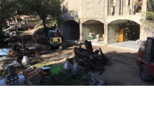 Preparing the area in front of the coal storage building